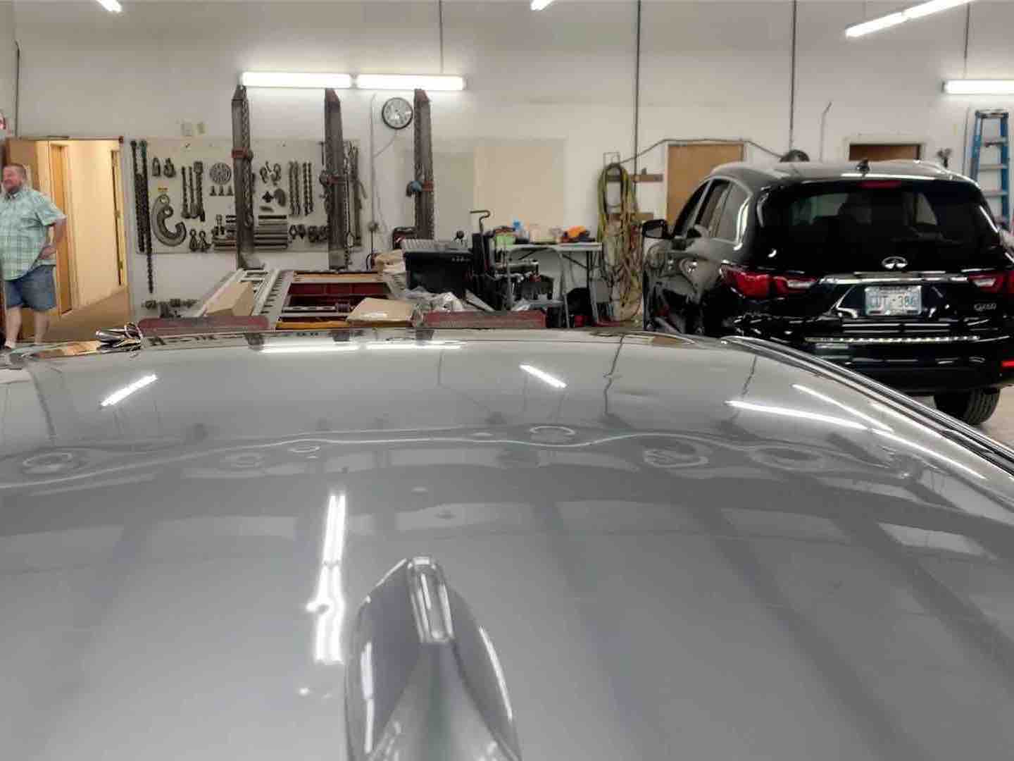 Hail damage repair on a car panel — before