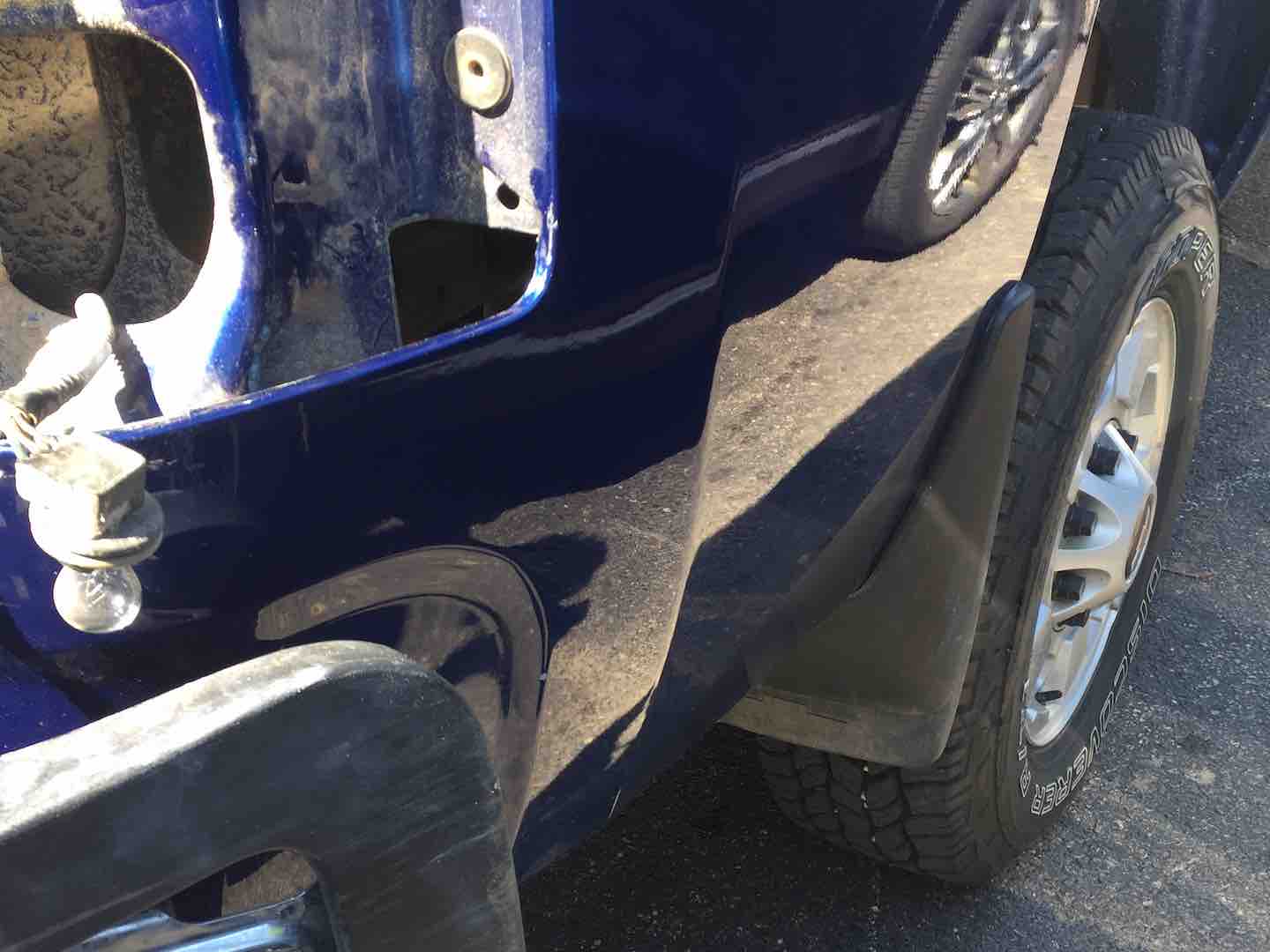 Paintless dent repair of a dent on a truck panel — after